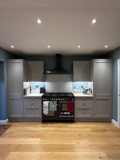 Finished kitchen renovation by Carson Contractors with fitted units and timber flooring